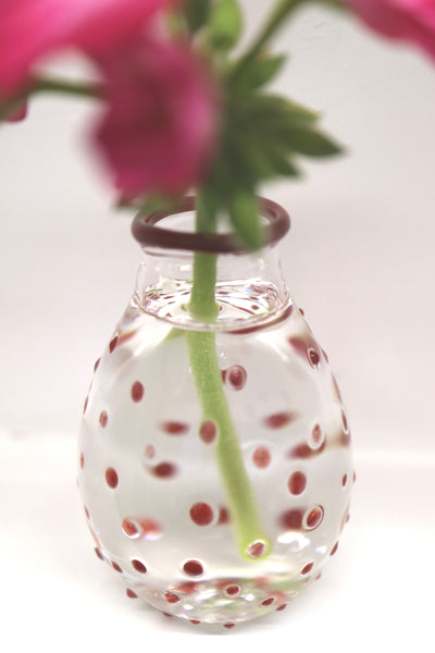 red dotted pattern magnified in water
