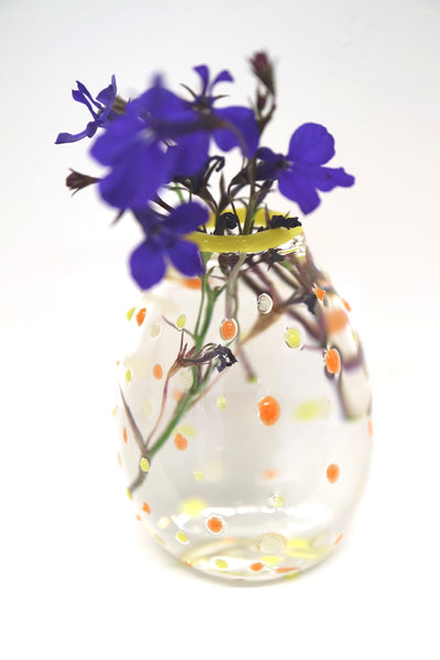yellow polka dots glass bud vase on display